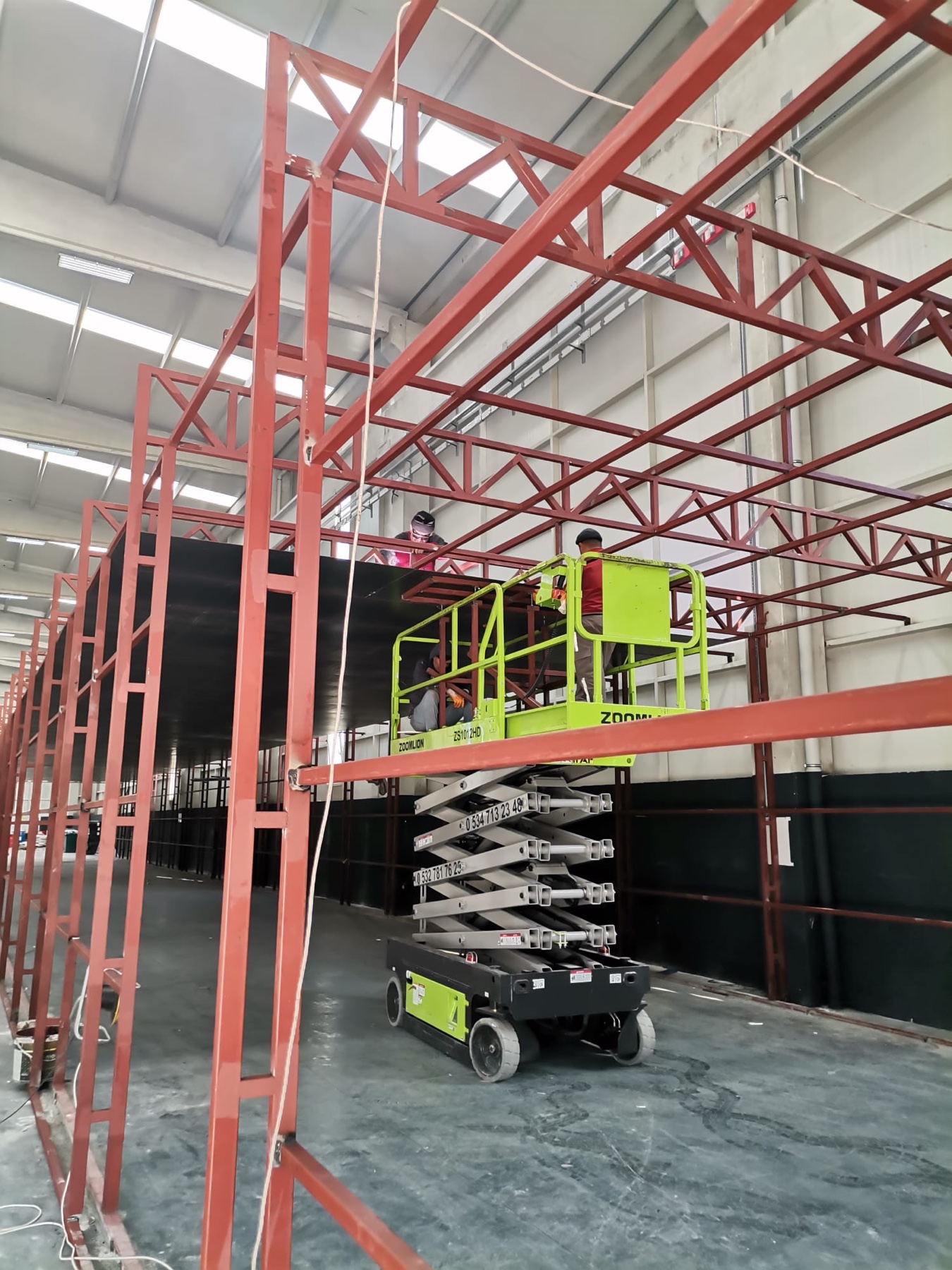 Steel shooting range structure being assembled at height