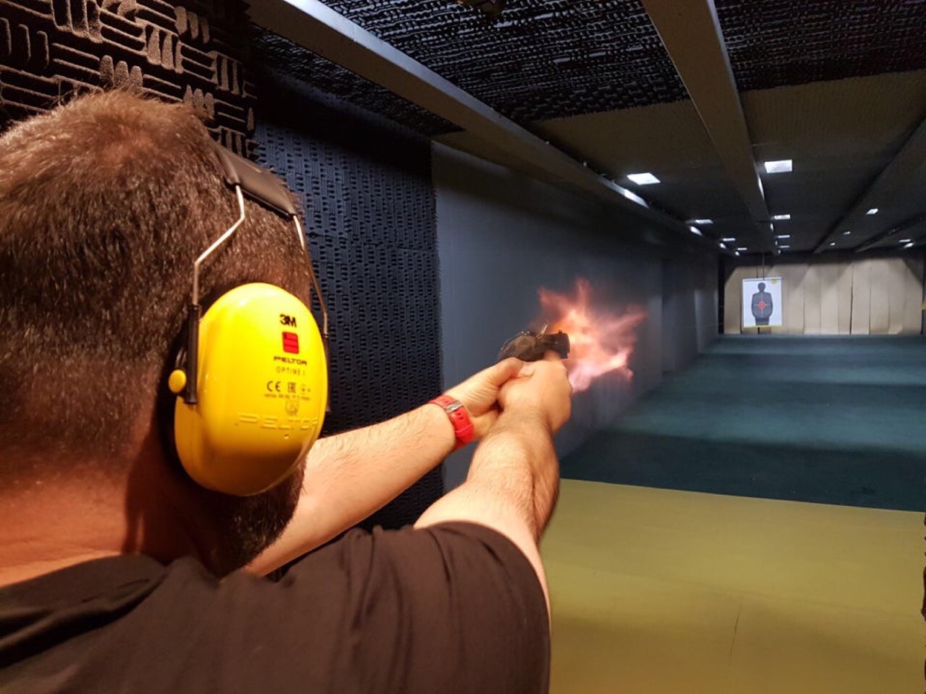 Shooter using a completed indoor range